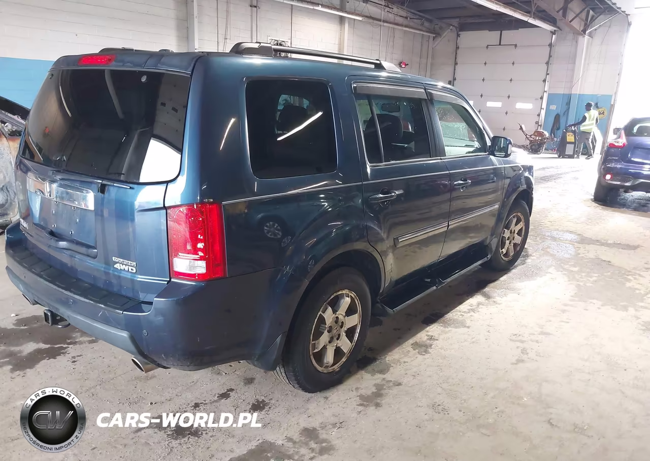 2010 Honda Pilot Touring VIN:5FNYF4H94AB006799 - 4
