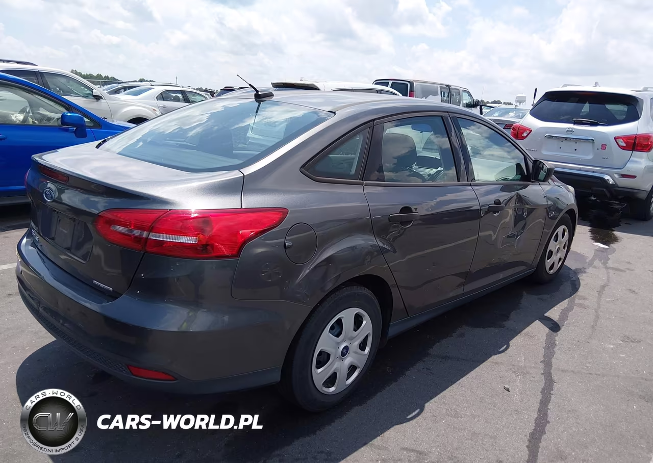2016 Ford Focus S VIN:1FADP3E26GL241049 - 4