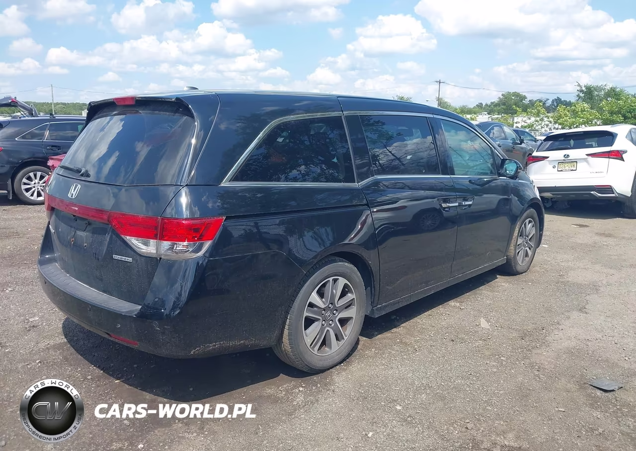 2015 Honda Odyssey Touring-Touring Elite VIN:5FNRL5H98FB104339 - 4