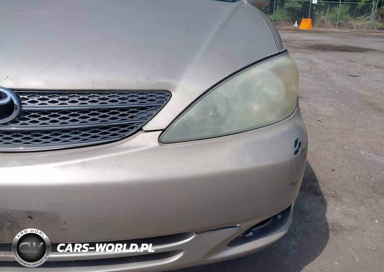 2002 Toyota Camry Le VIN:JTDBE32K720049743 - 14