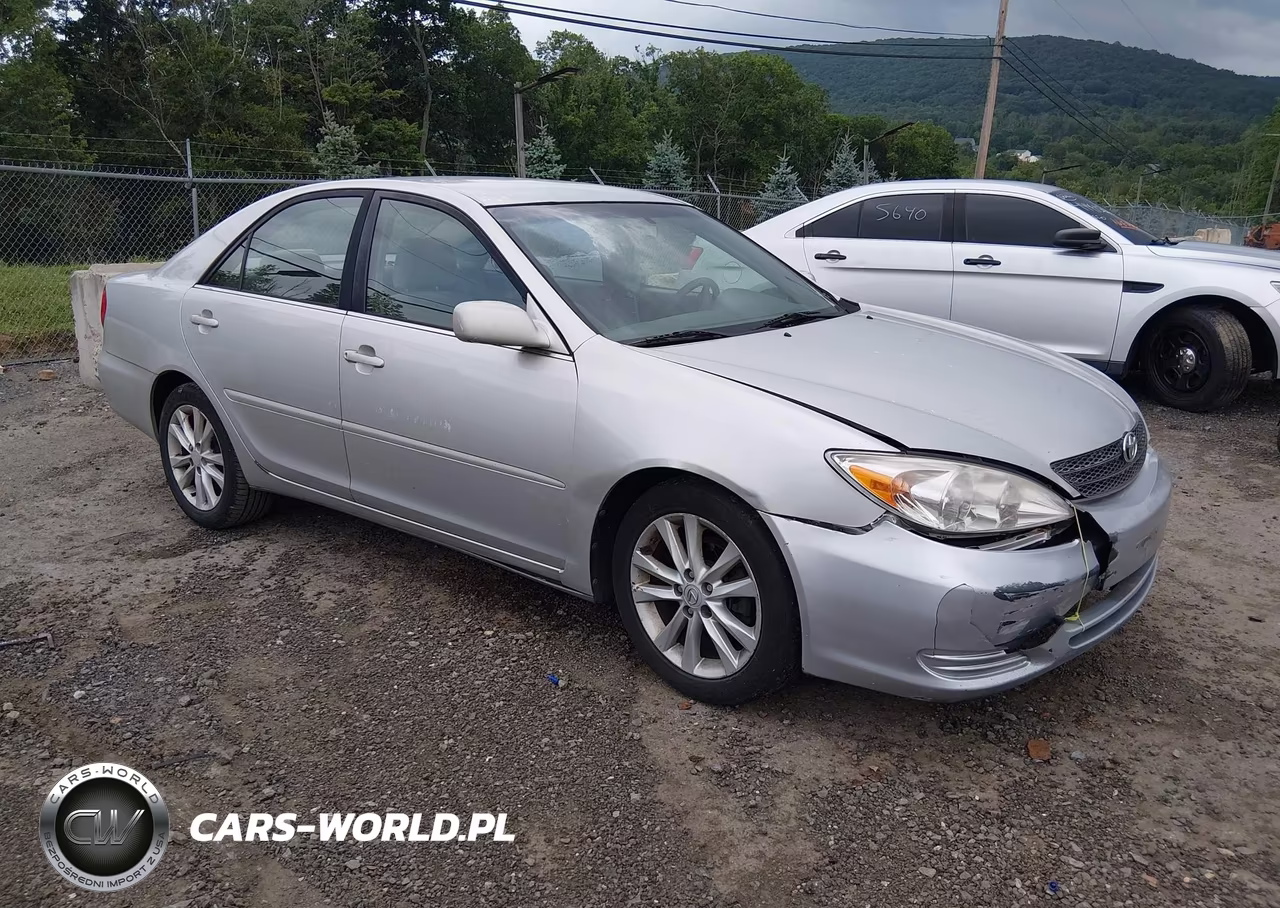 2002 Toyota Camry Le VIN:4T1BF32K62U506642 - 1