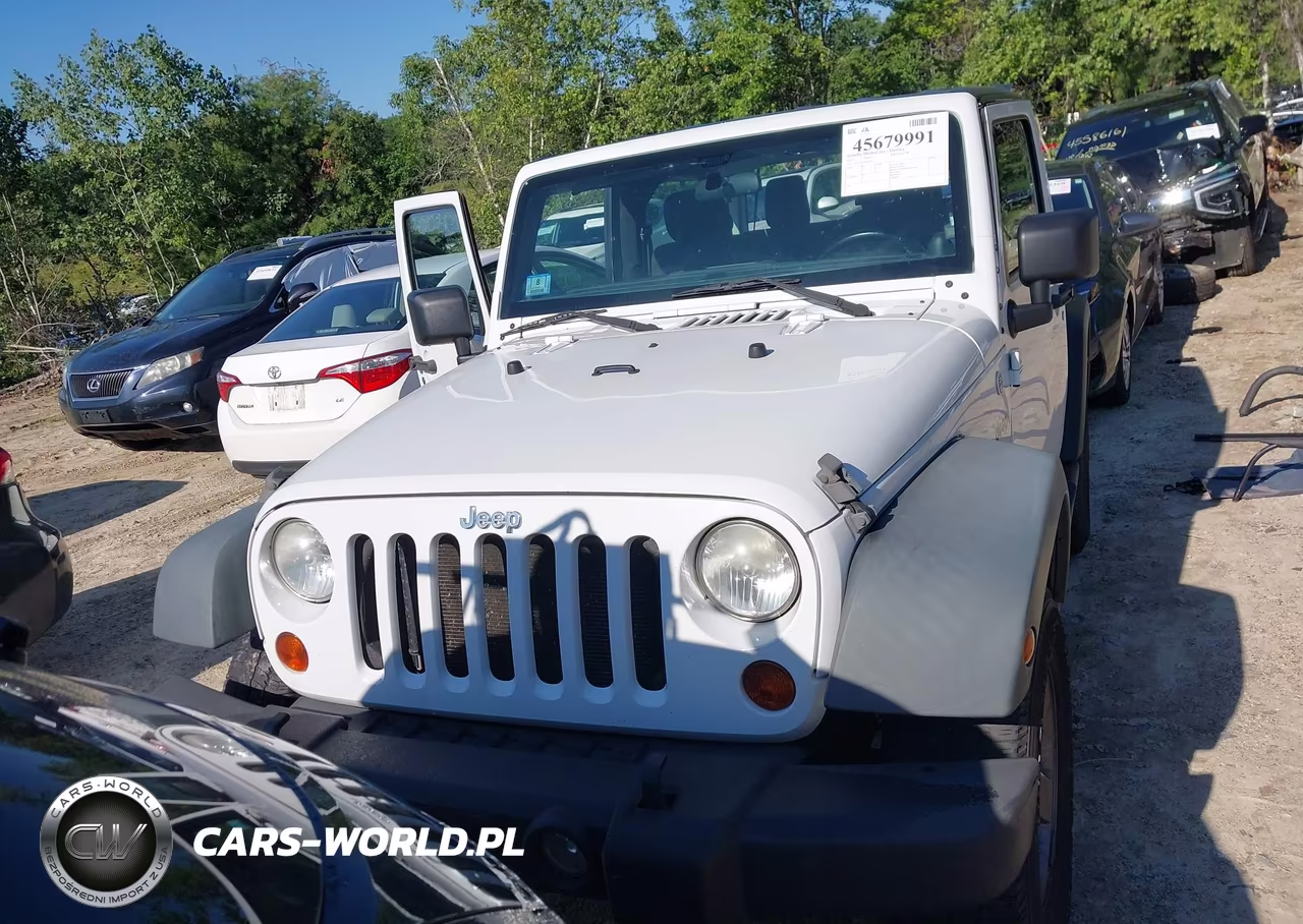2011 Jeep Wrangler Sport VIN:1J4AA2D17BL629024 - 13