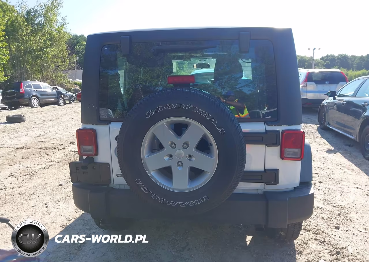 2011 Jeep Wrangler Sport VIN:1J4AA2D17BL629024 - 17