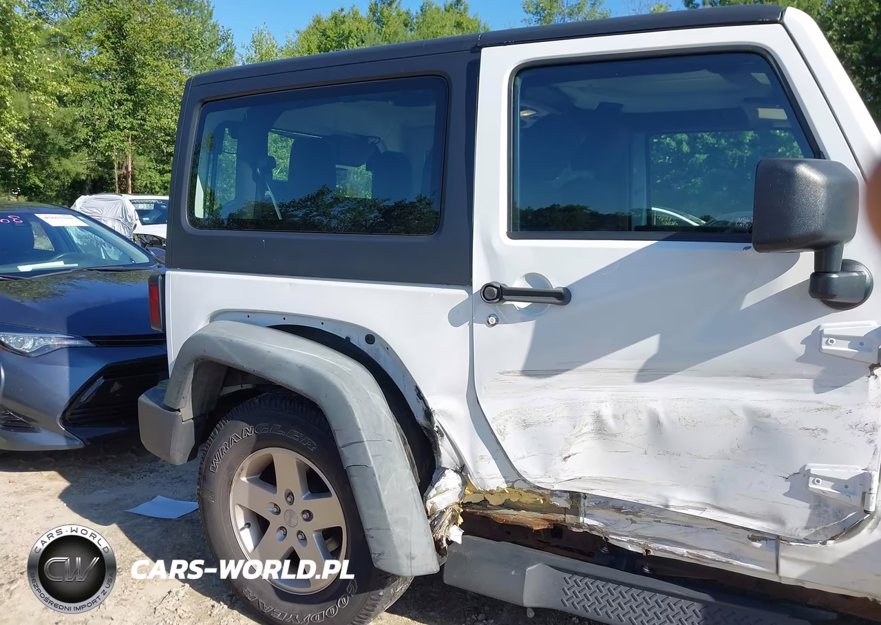 2011 Jeep Wrangler Sport VIN:1J4AA2D17BL629024 - 18