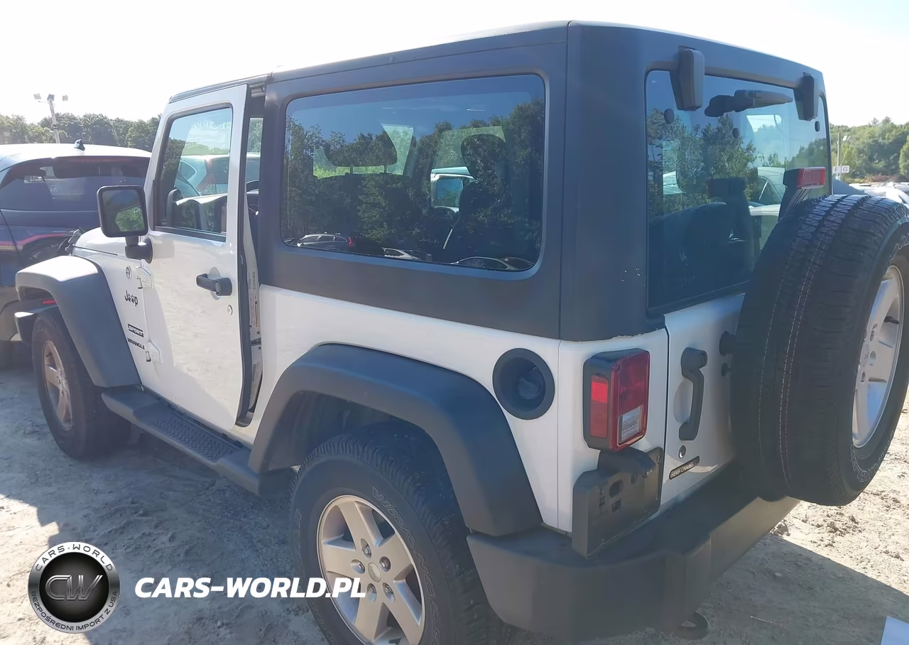 2011 Jeep Wrangler Sport VIN:1J4AA2D17BL629024 - 3