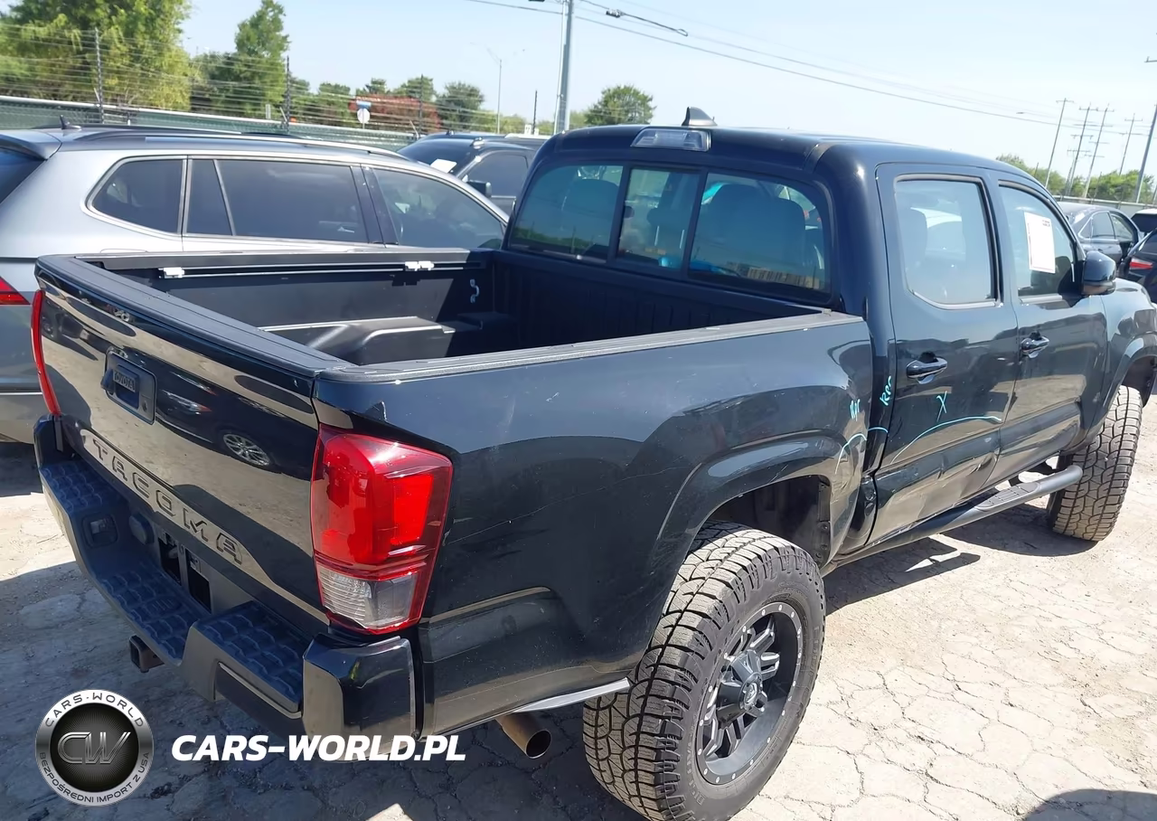 2018 Toyota Tacoma Sr VIN:5TFAX5GN2JX116825 - 4