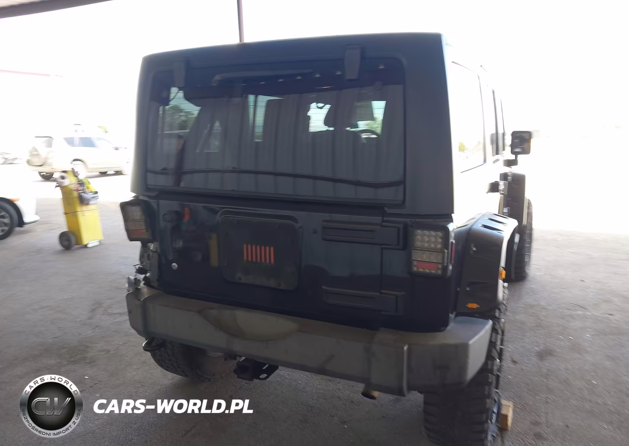 2013 Jeep Wrangler Unlimited Sport VIN:1C4BJWDG5DL577580 - 4