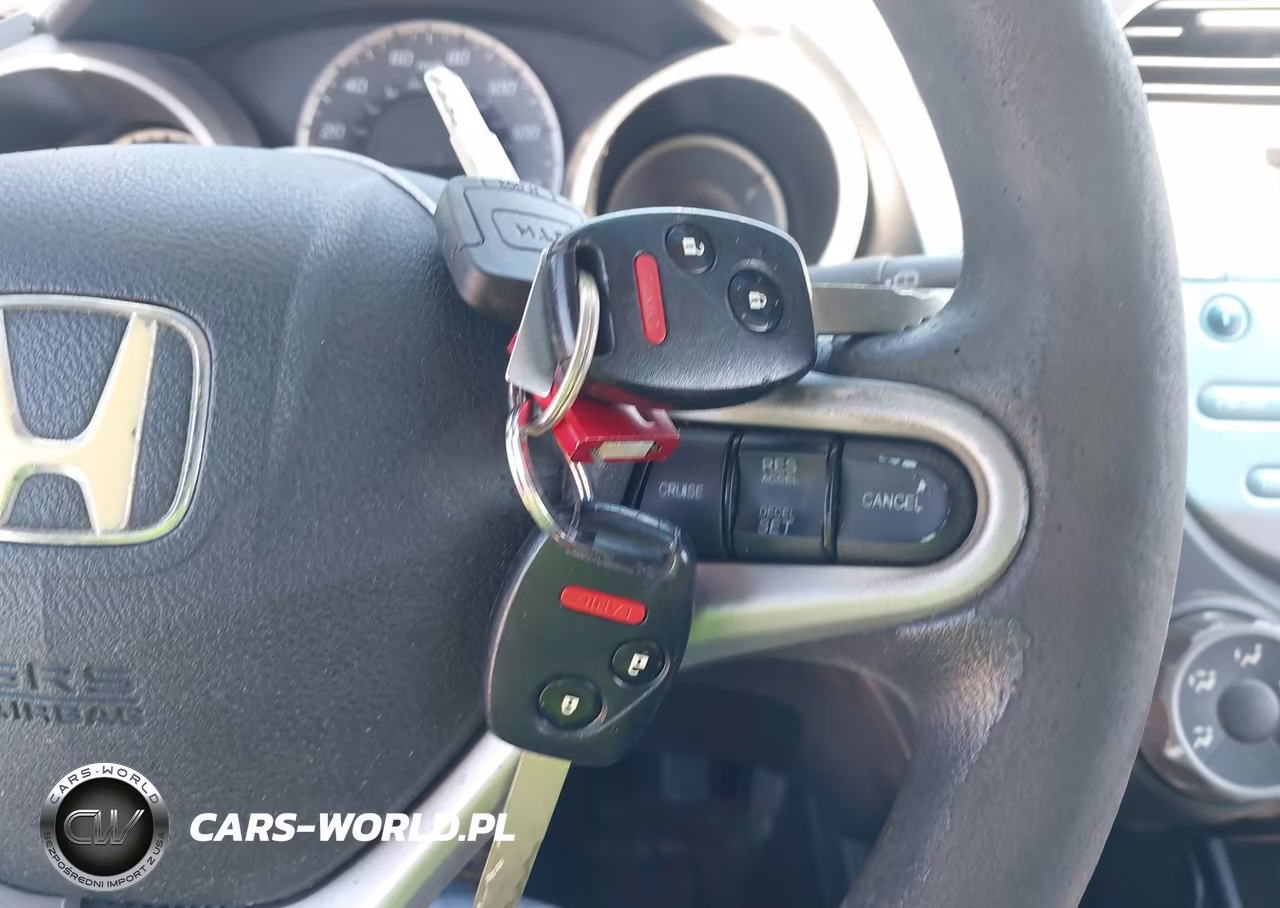 2012 Honda Fit VIN:JHMGE8H32CC035301 - 11