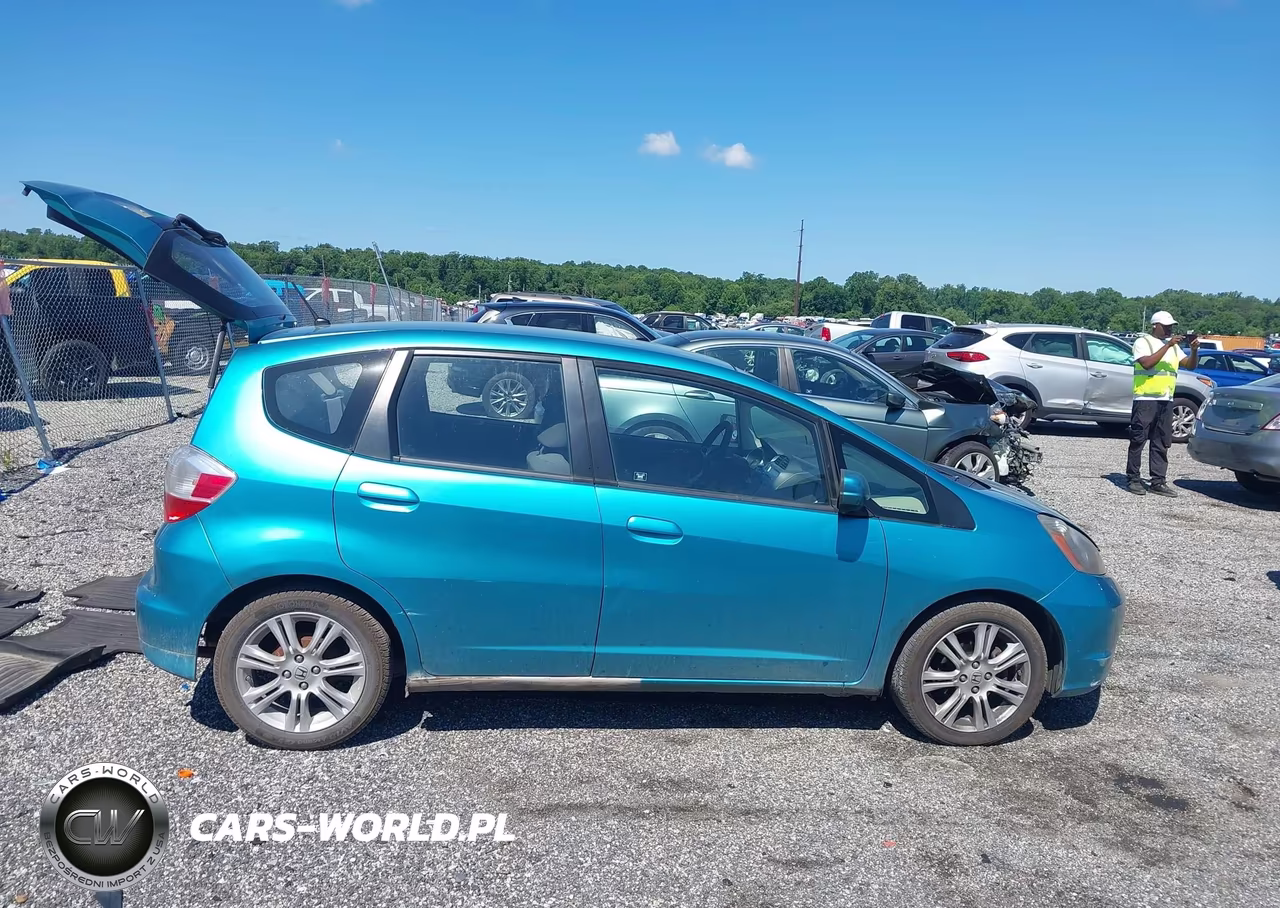 2012 Honda Fit VIN:JHMGE8H32CC035301 - 13