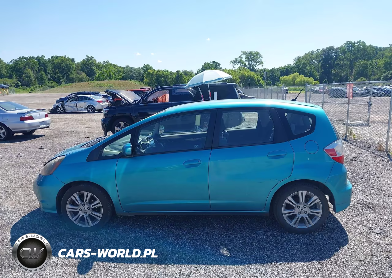 2012 Honda Fit VIN:JHMGE8H32CC035301 - 14