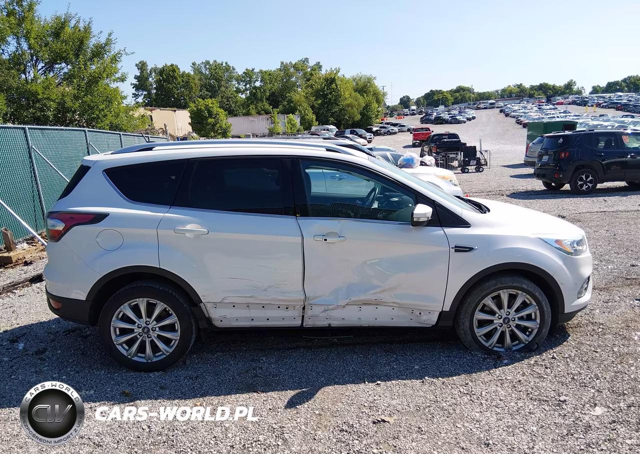 2017 Ford Escape Titanium VIN:1FMCU0J98HUB40649 - 13