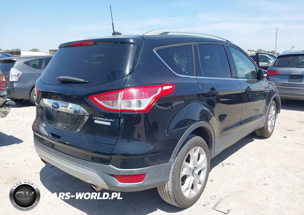 2016 Ford Escape Titanium VIN:1FMCU0JX3GUC24262 - 4