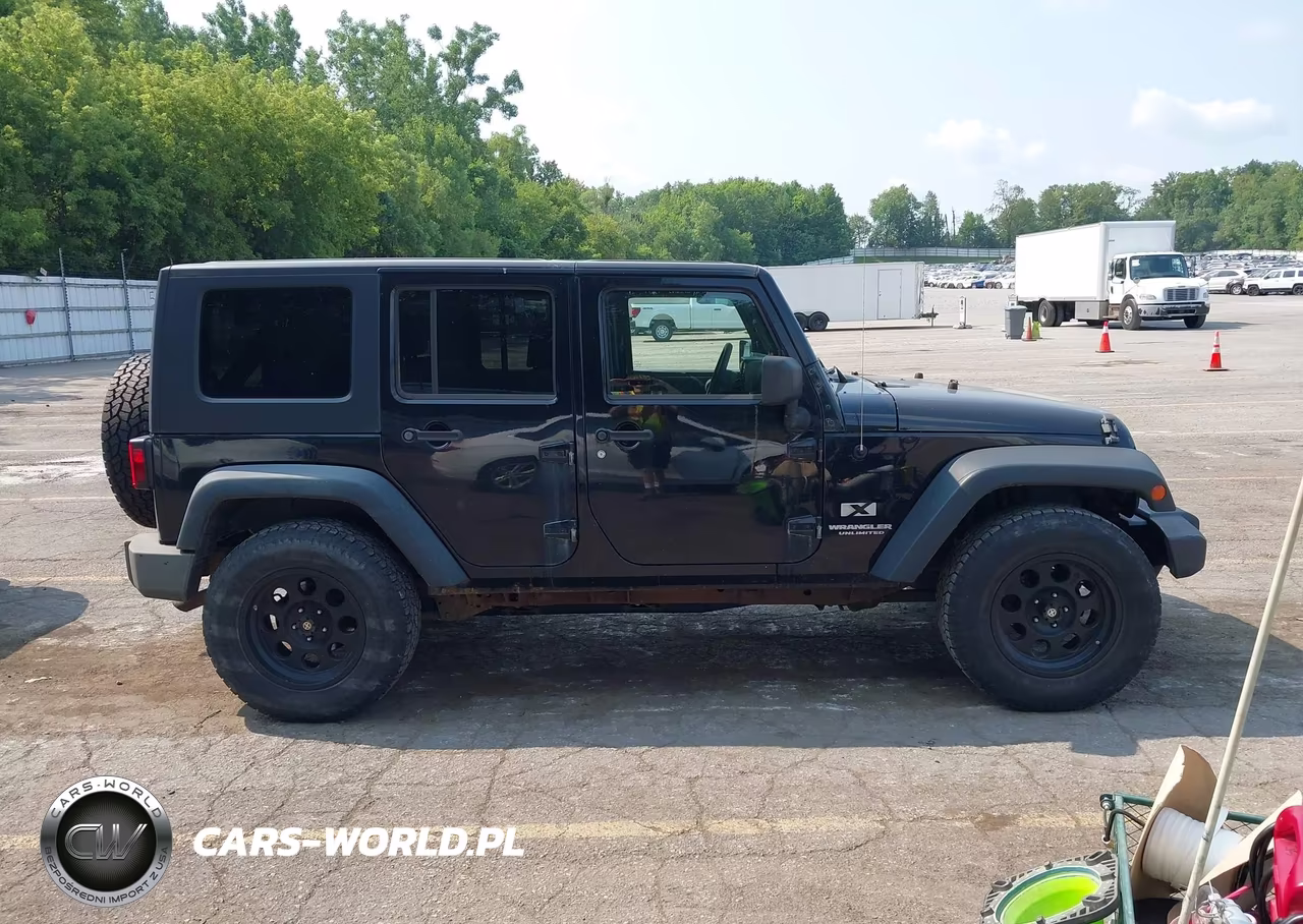 2009 Jeep Wrangler Unlimited X VIN:1J4GA39169L763865 - 13