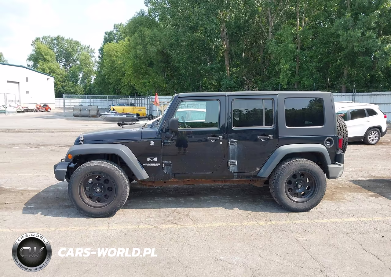 2009 Jeep Wrangler Unlimited X VIN:1J4GA39169L763865 - 14