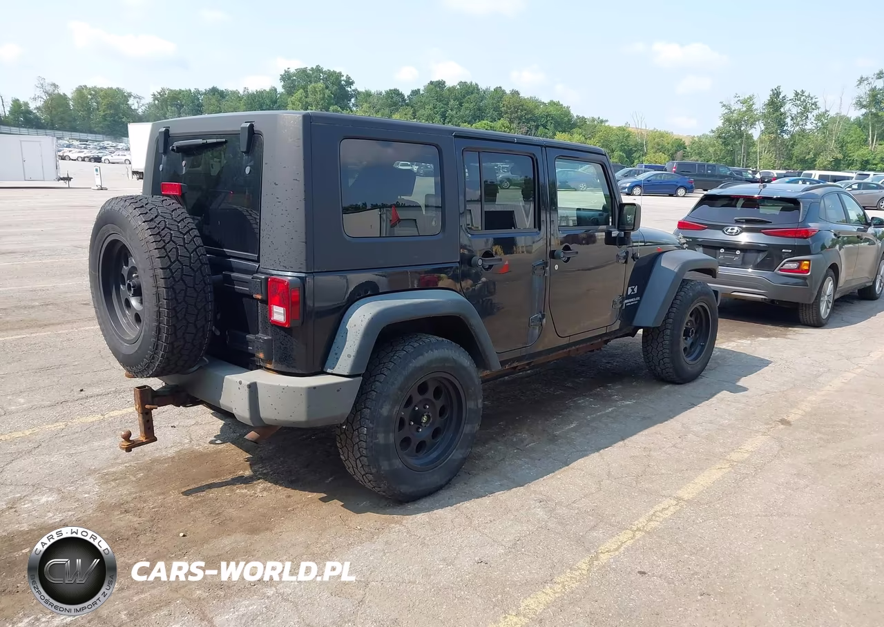 2009 Jeep Wrangler Unlimited X VIN:1J4GA39169L763865 - 4