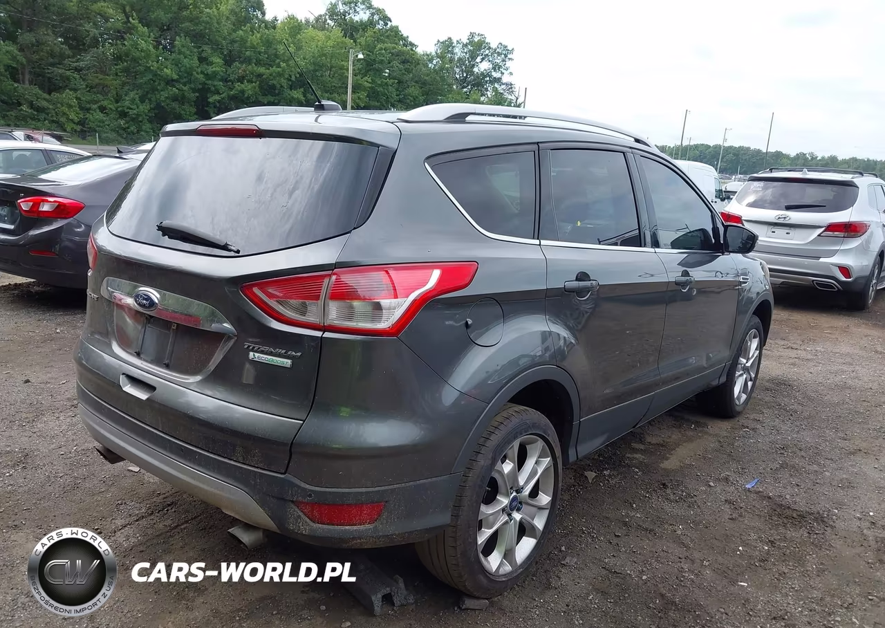 2015 Ford Escape Titanium VIN:1FMCU0J94FUA20361 - 4
