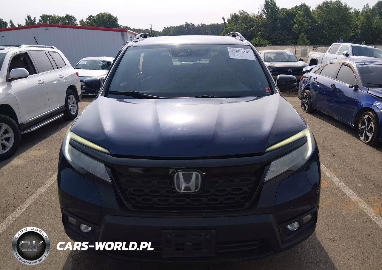 2019 Honda Passport Touring VIN:5FNYF7H90KB000128 - 12