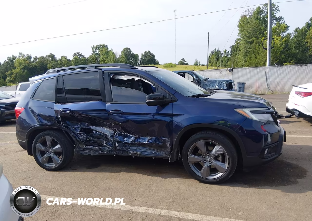 2019 Honda Passport Touring VIN:5FNYF7H90KB000128 - 13