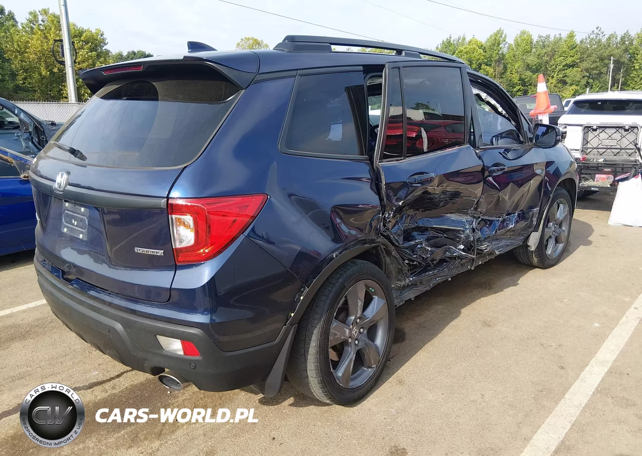 2019 Honda Passport Touring VIN:5FNYF7H90KB000128 - 4
