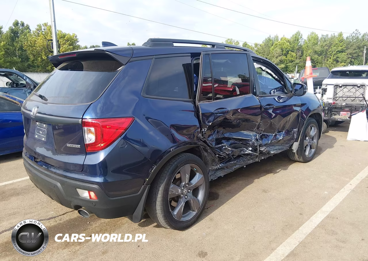 2019 Honda Passport Touring VIN:5FNYF7H90KB000128 - 6