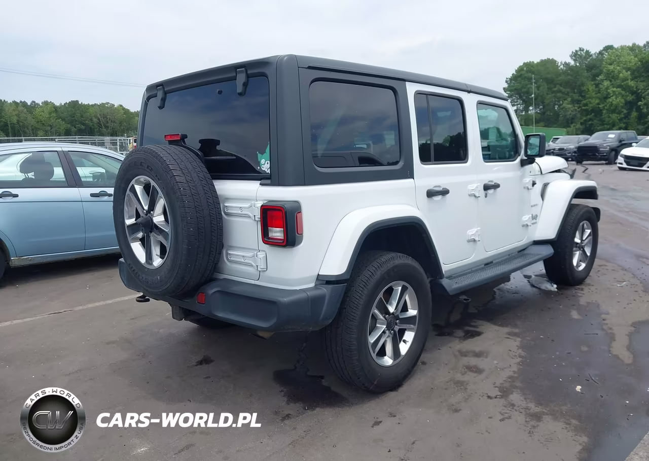 2019 Jeep Wrangler Unlimited Sahara 4X4 VIN:1C4HJXEN4KW547530 - 4