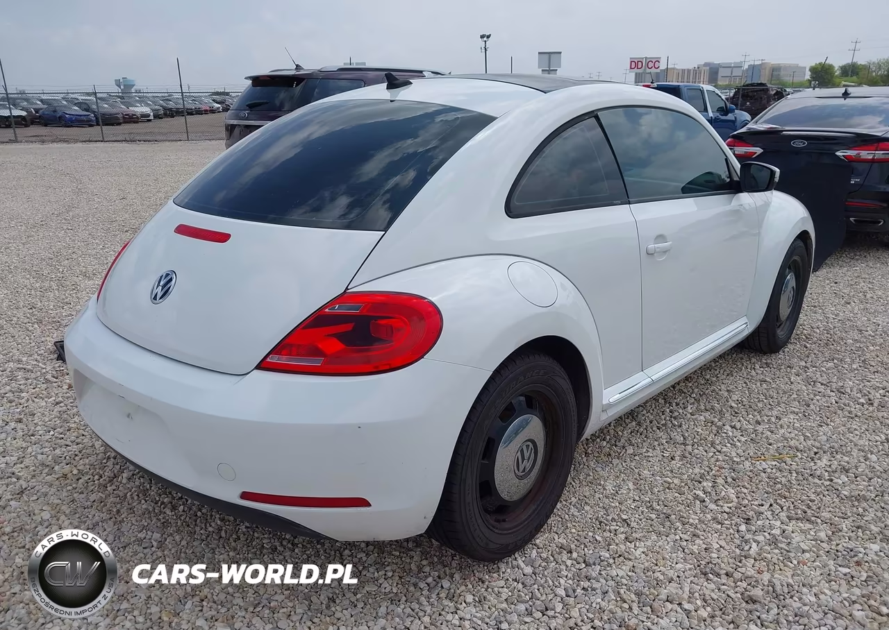 2014 Volkswagen Beetle 2.5L VIN:3VWJX7AT3EM606136 - 4