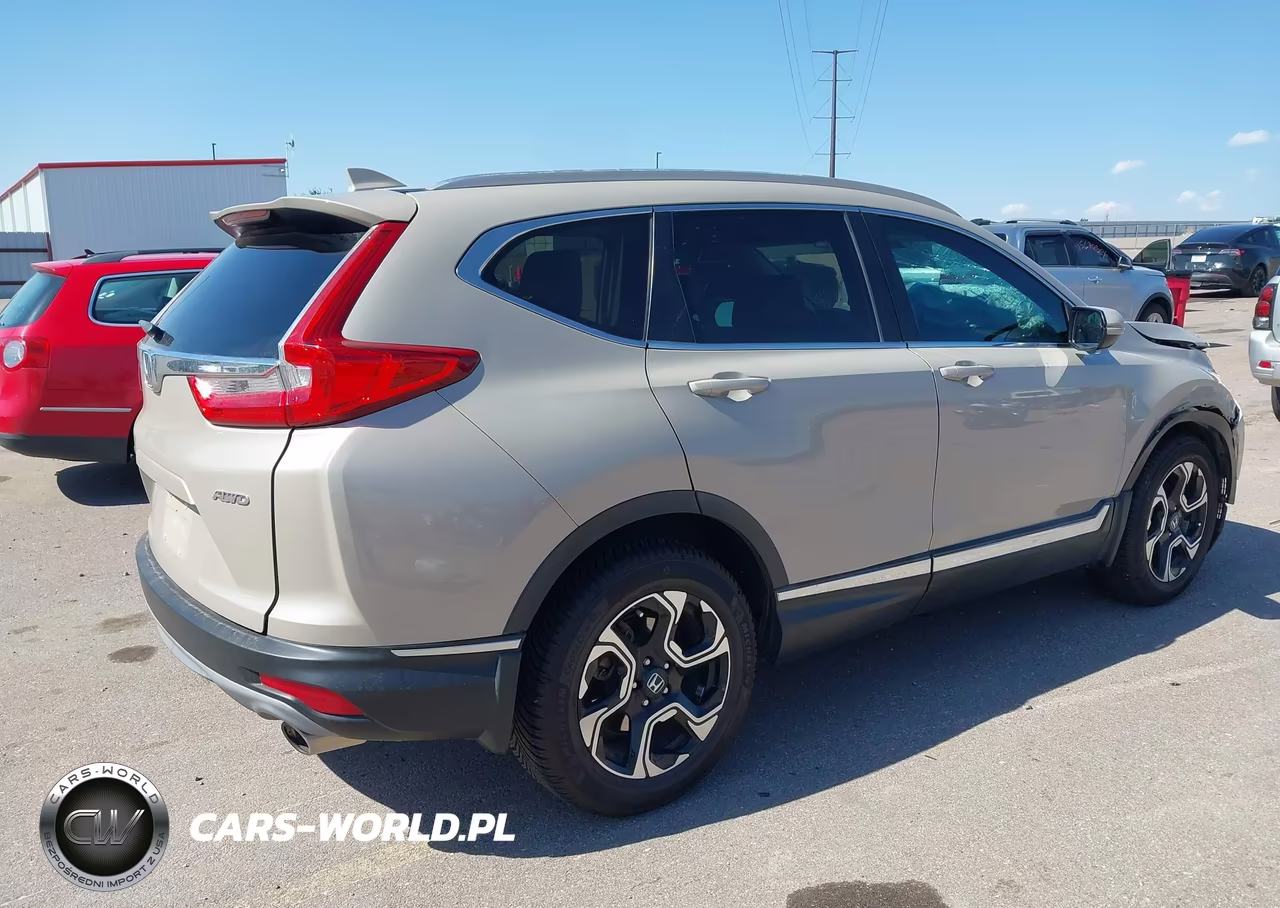 2019 Honda Cr-V Touring VIN:2HKRW2H91KH608202 - 4