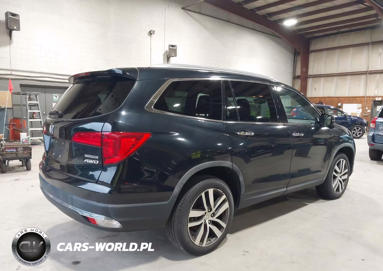 2016 Honda Pilot Touring VIN:5FNYF6H98GB014604 - 4