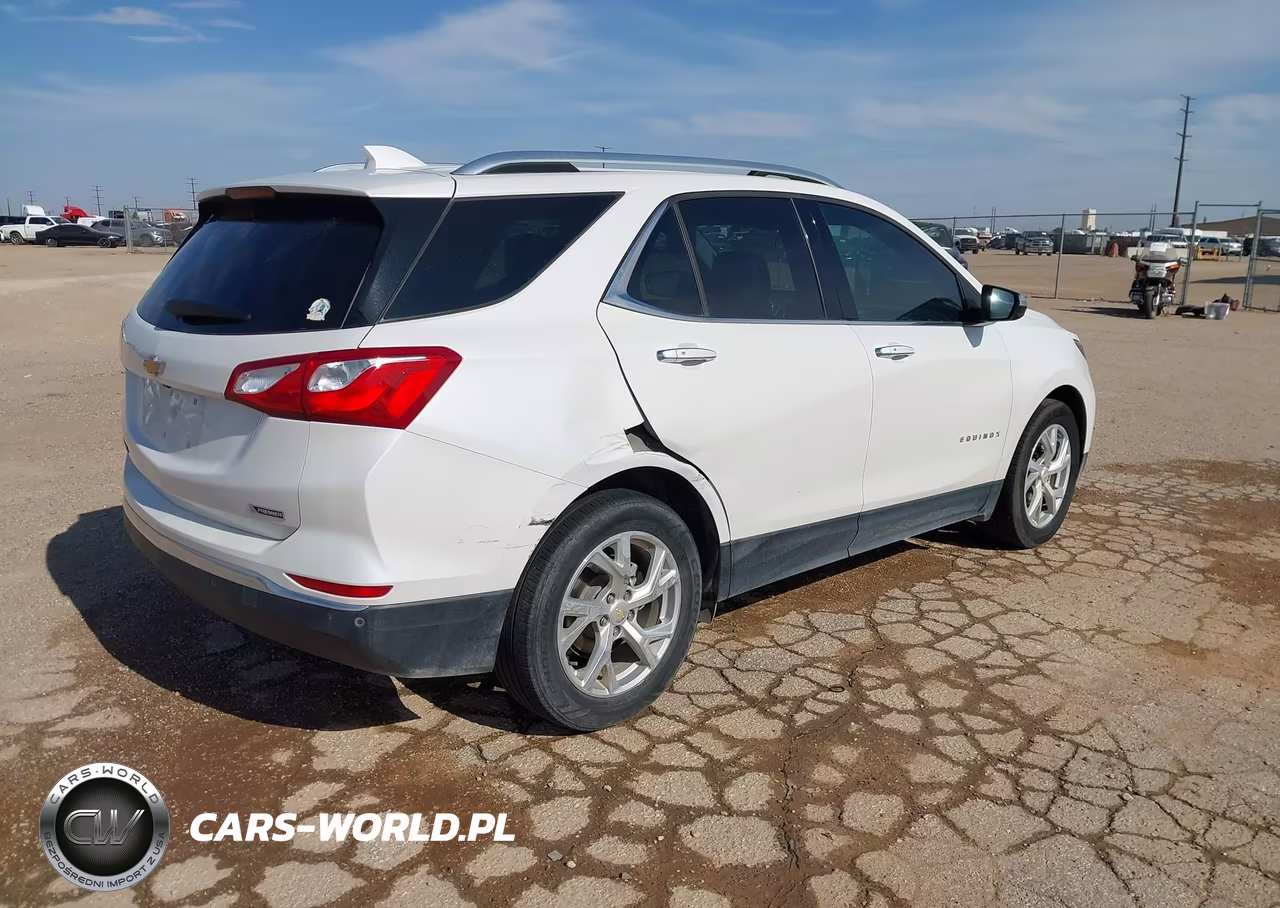 2018 Chevrolet Equinox Premier VIN:2GNAXMEV9J6211631 - 4