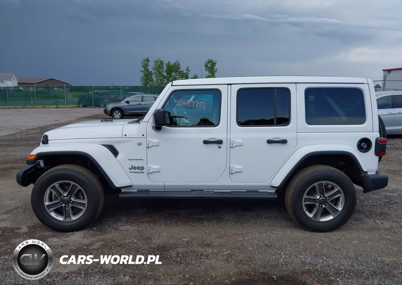 2019 Jeep Wrangler Unlimited Sahara 4X4 VIN:1C4HJXEG7KW661877 - 14