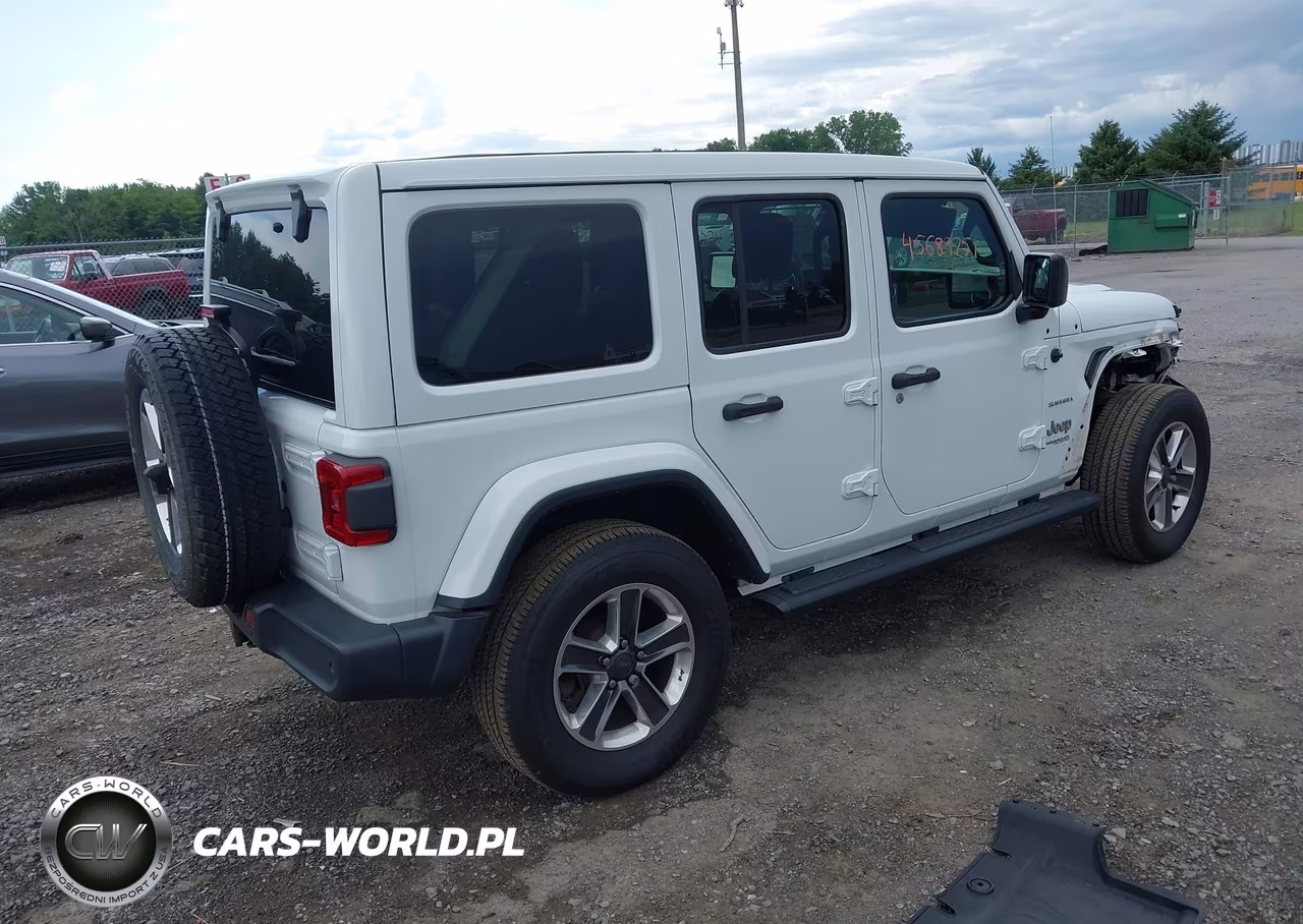 2019 Jeep Wrangler Unlimited Sahara 4X4 VIN:1C4HJXEG7KW661877 - 4