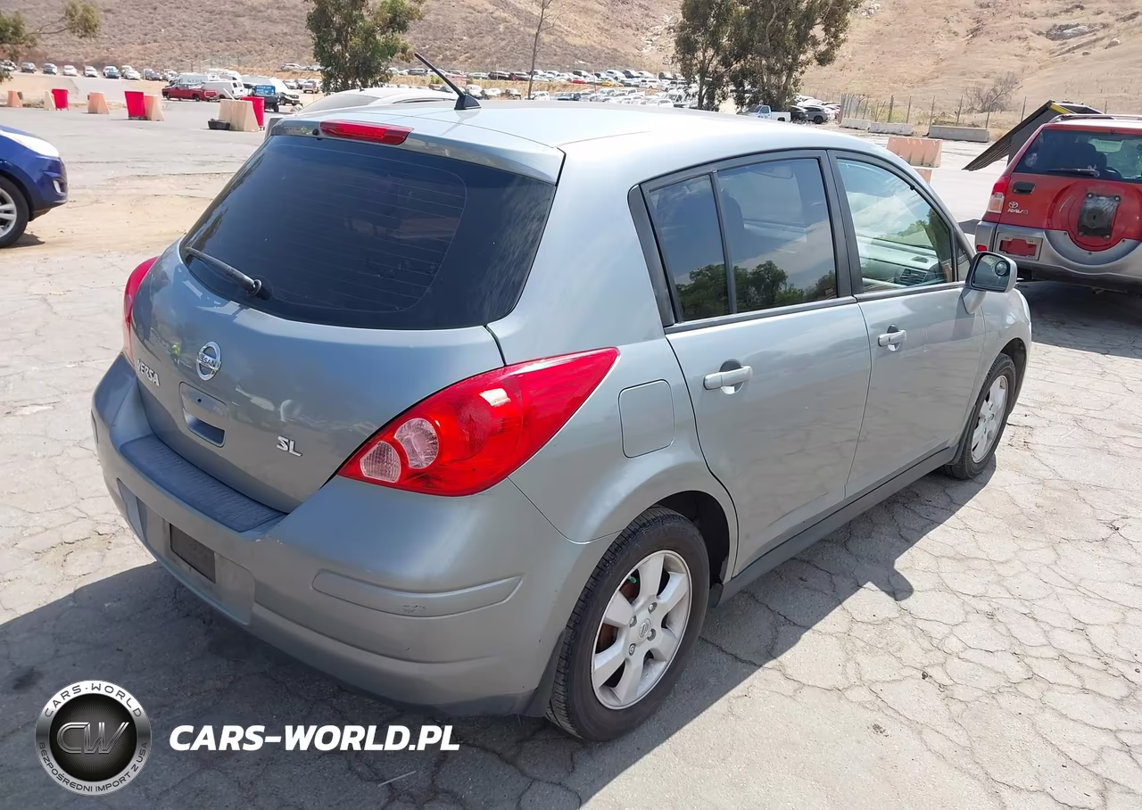 2009 Nissan Versa 1.8Sl VIN:3N1BC13E19L414890 - 4