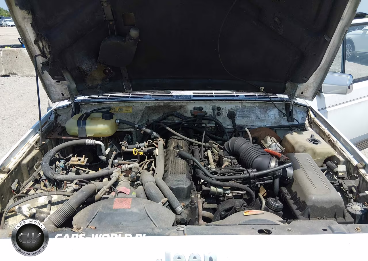 1990 Jeep Cherokee Laredo VIN:1J4FT58L9LL171307 - 10