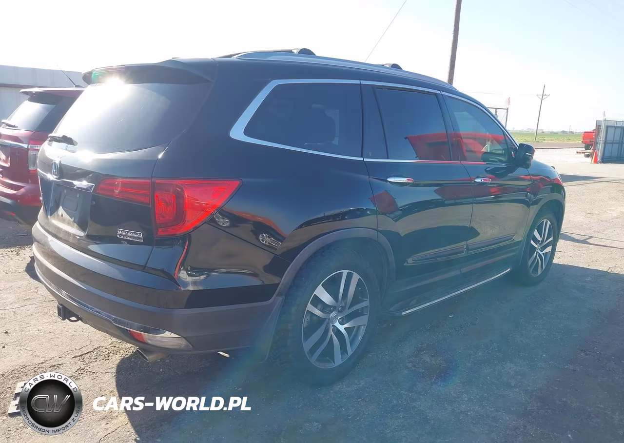 2016 Honda Pilot Touring VIN:5FNYF5H99GB044060 - 4