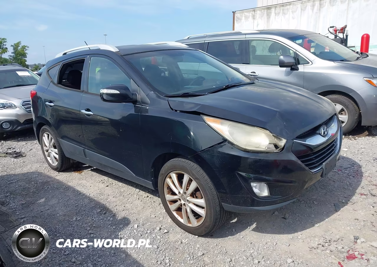 2012 Hyundai Tucson Limited VIN:KM8JUCAC8CU511886 - 1