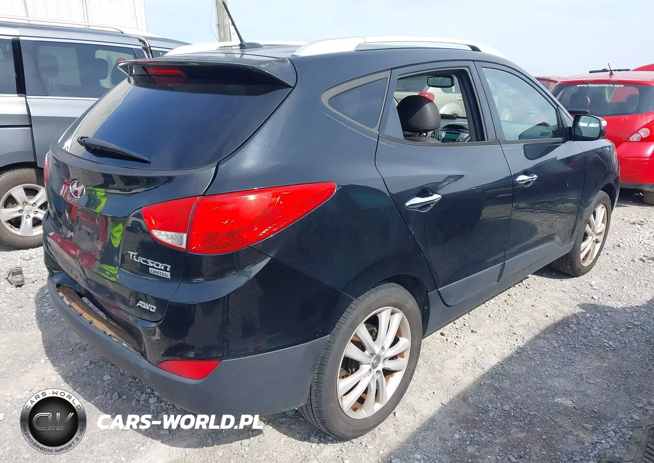 2012 Hyundai Tucson Limited VIN:KM8JUCAC8CU511886 - 4