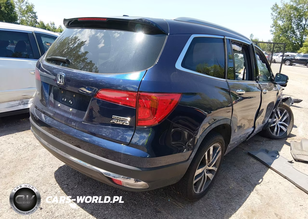 2016 Honda Pilot Touring VIN:5FNYF6H95GB097957 - 4