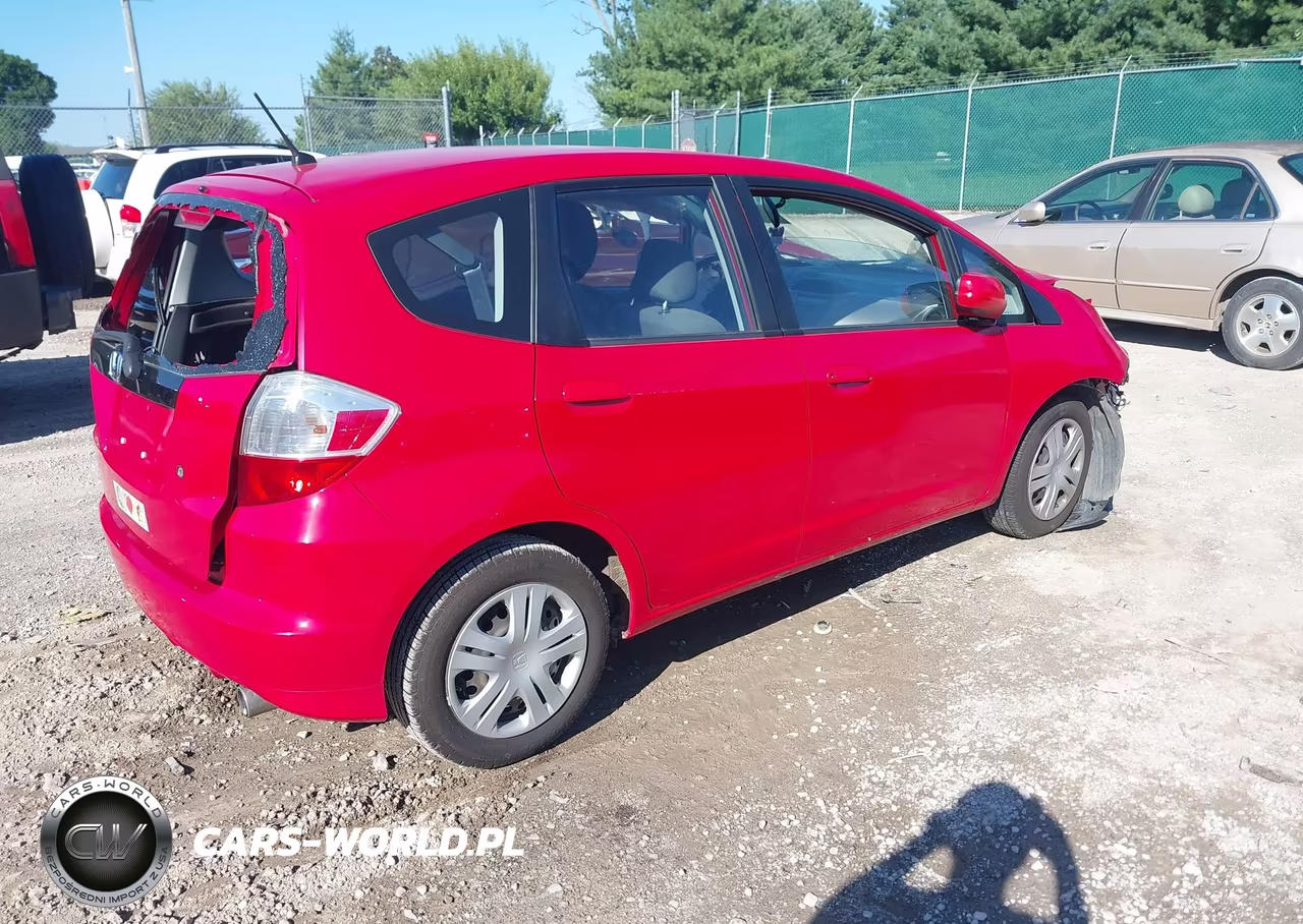 2009 Honda Fit VIN:JHMGE88279C002584 - 4
