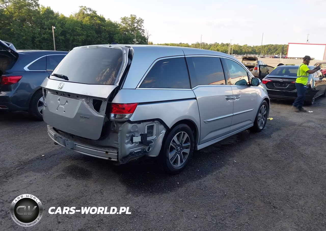 2015 Honda Odyssey Touring-Touring Elite VIN:5FNRL5H91FB094088 - 4