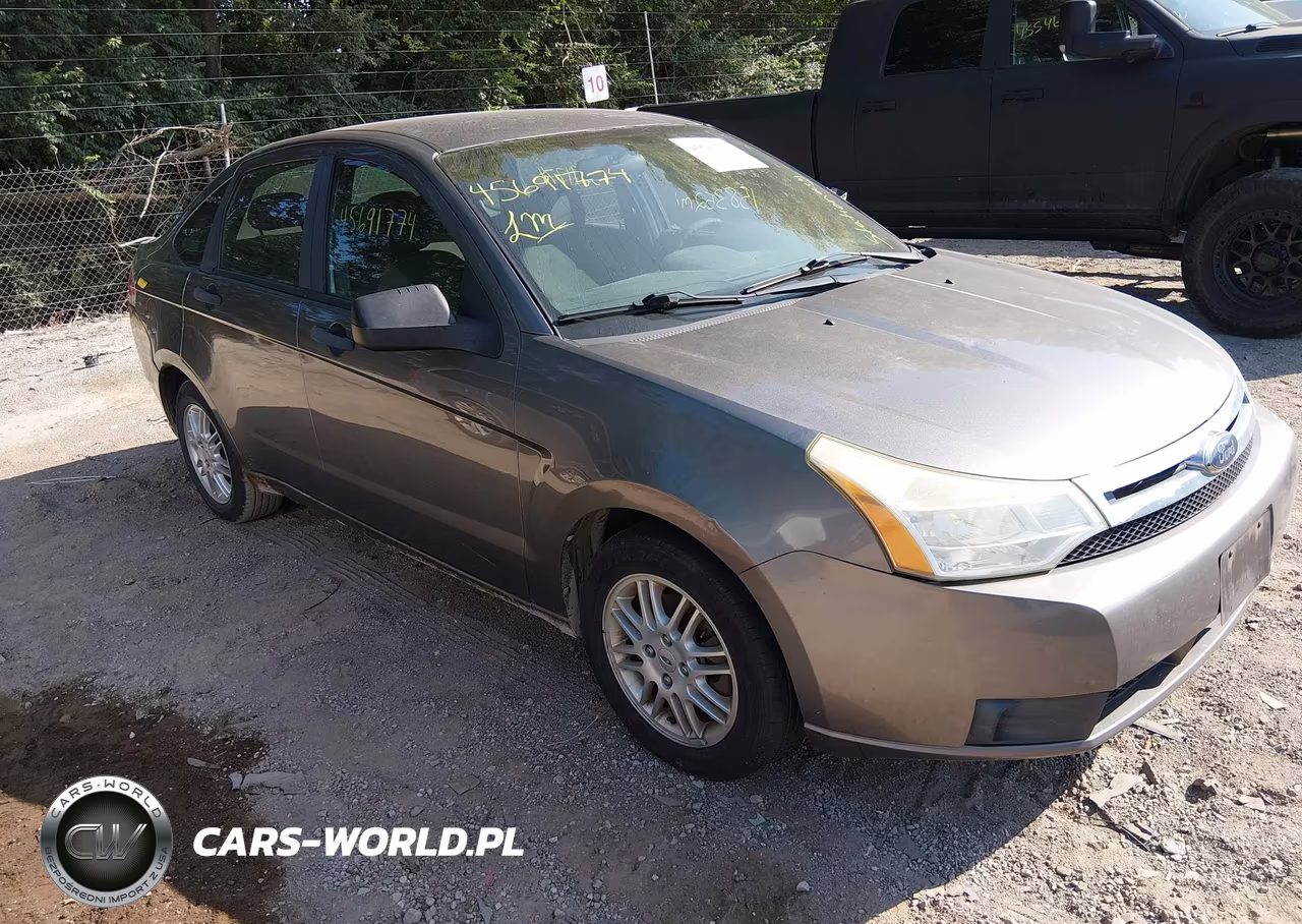 2010 Ford Focus Se VIN:1FAHP3FN4AW147557 - 1