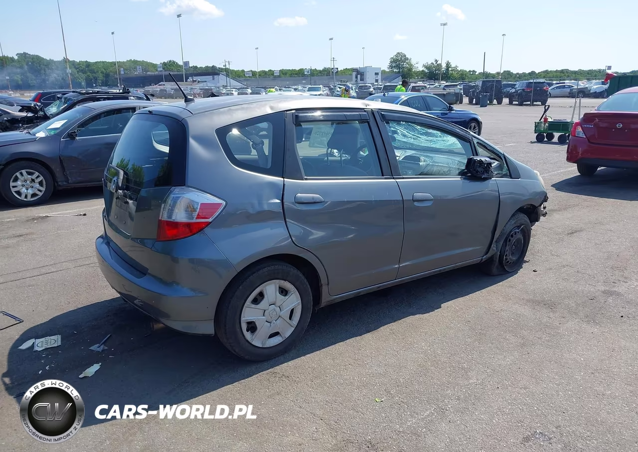 2012 Honda Fit VIN:JHMGE8H36CS003960 - 4