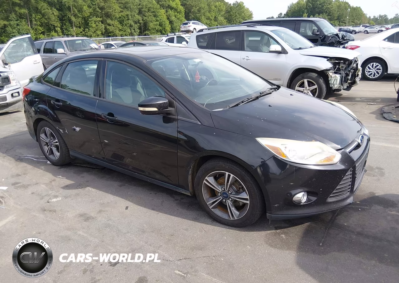 2014 Ford Focus Se VIN:1FADP3F22EL435976 - 1
