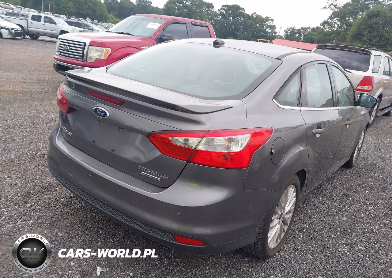 2014 Ford Focus Titanium VIN:1FADP3J21EL279579 - 4