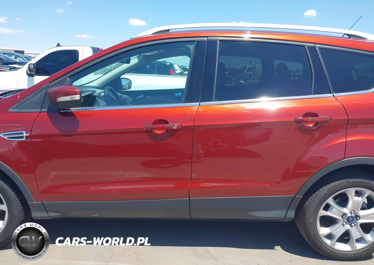 2016 Ford Escape Titanium VIN:1FMCU0J97GUC12083 - 14