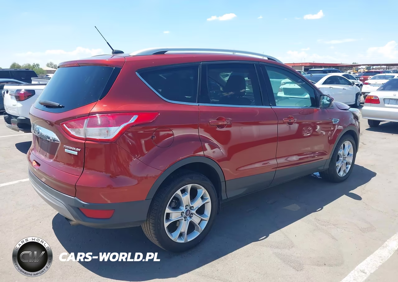 2016 Ford Escape Titanium VIN:1FMCU0J97GUC12083 - 4