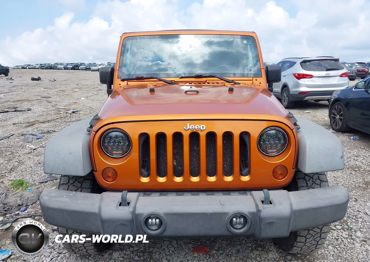 2011 Jeep Wrangler Sport VIN:1J4GA2D10BL620255 - 13