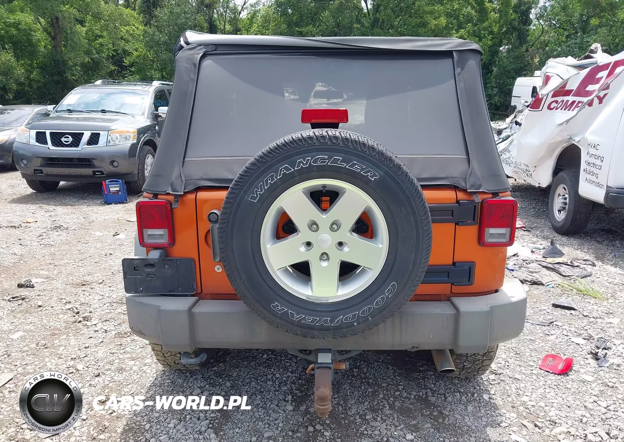 2011 Jeep Wrangler Sport VIN:1J4GA2D10BL620255 - 17