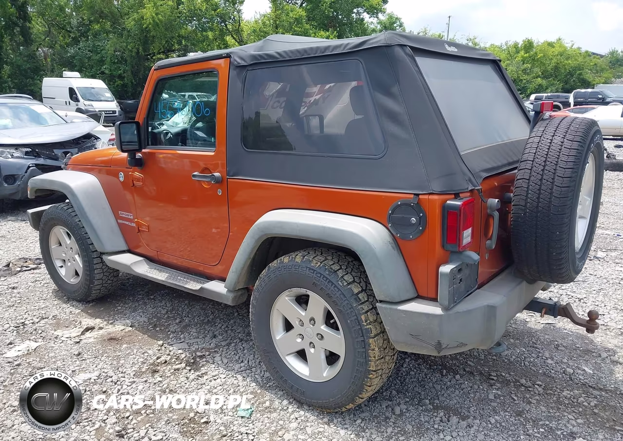 2011 Jeep Wrangler Sport VIN:1J4GA2D10BL620255 - 3
