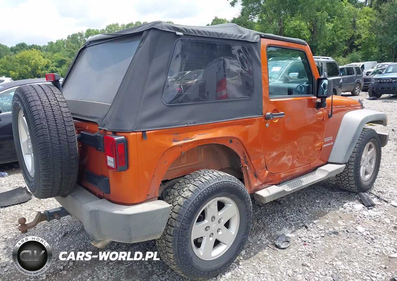 2011 Jeep Wrangler Sport VIN:1J4GA2D10BL620255 - 4