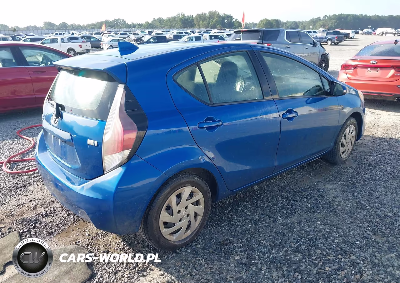 2015 Toyota Prius C One VIN:JTDKDTB31F1103985 - 4
